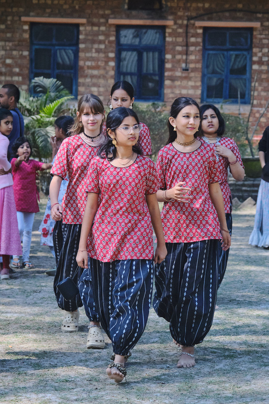 Girls in matching outfits on campus