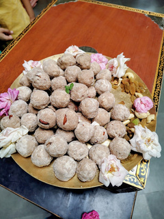 Prasadam — freshly prepared laddus offered to students